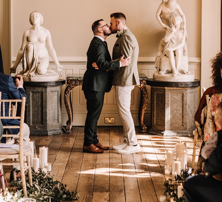 The two grooms share their first kiss as a married couple 