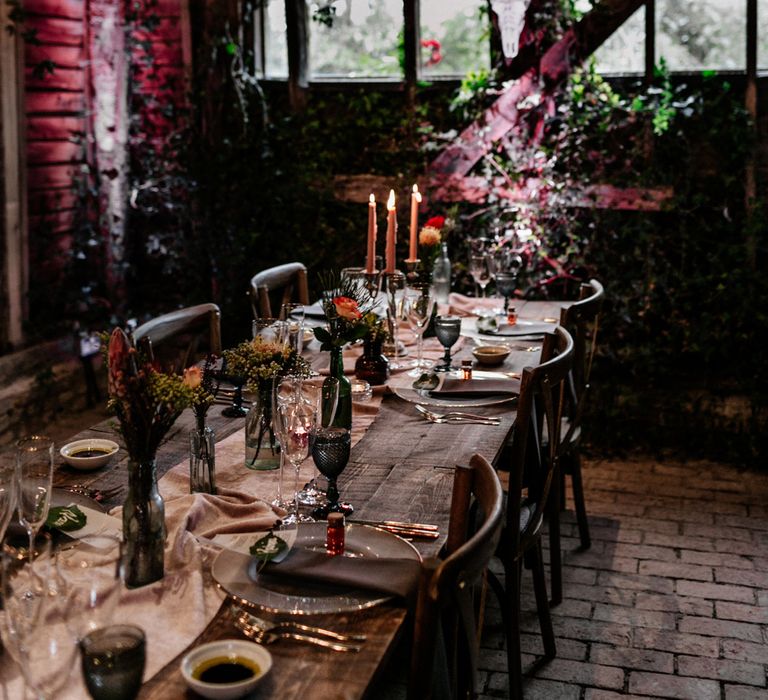 Intimate barn wedding reception with festoon lights at High Billinghurst Farm