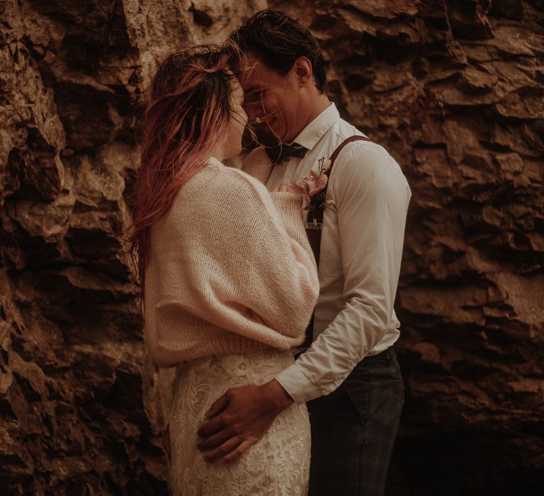 Bride in wooden cardigan at intimate elopement