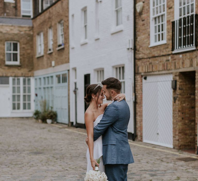 Bride and groom portrait in London streets by Maja Tsolo Photography