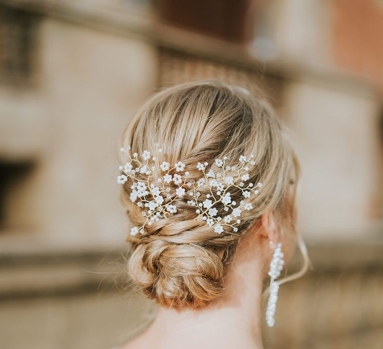 pinned wedding hairstyle with jewelled hair vine bridal accessory 