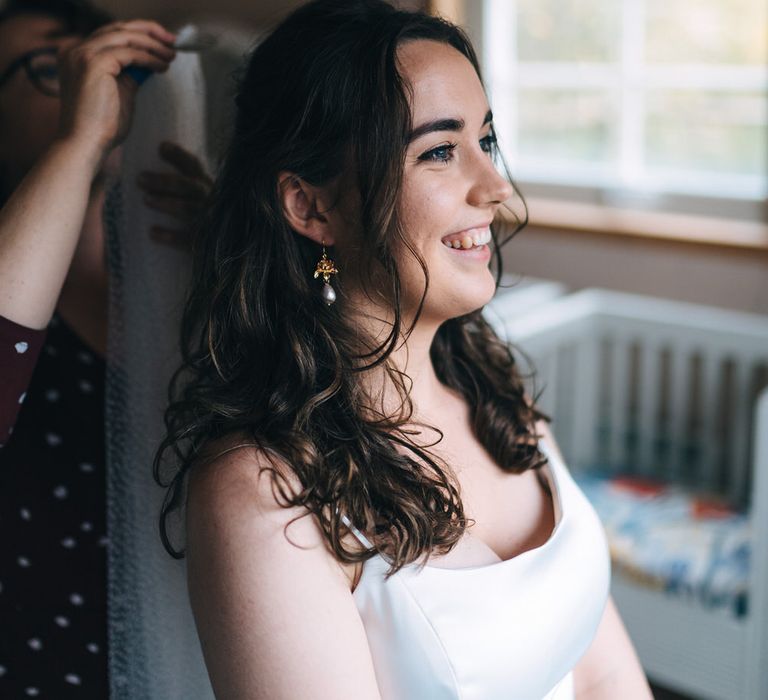 Bride having her micro dot veil from AM Faulkner fitted