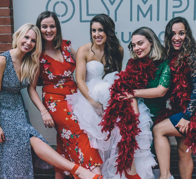 Bride celebrating wedding day with friends