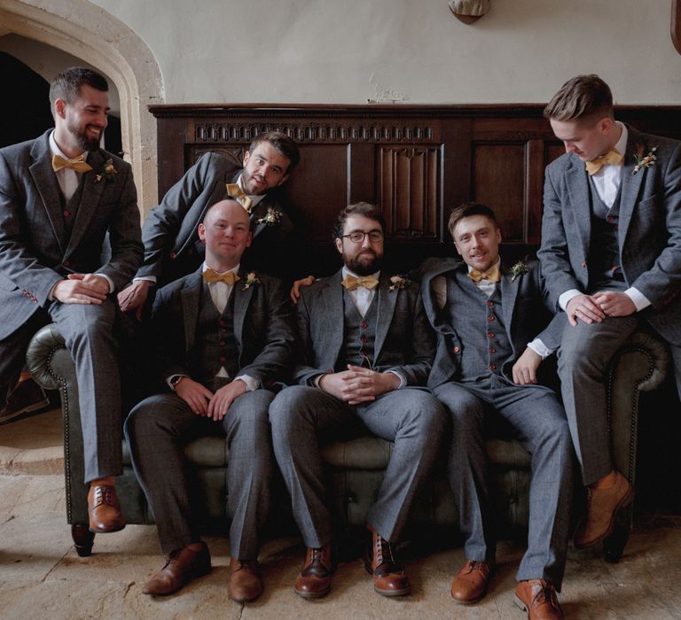 Groomsmen on the morning of their wedding at Brympton House