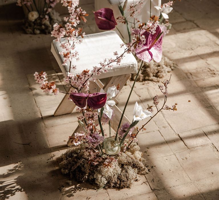 Purple anthurium and blossom wedding flowers 