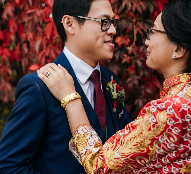 Bride & groom look lovingly at one another on their wedding day