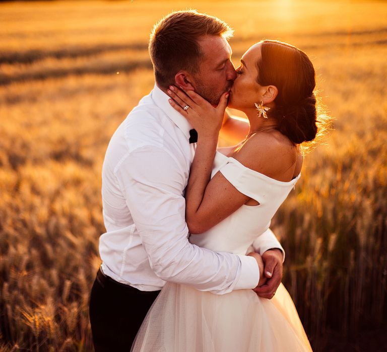 Beautiful sunset wedding portrait for bride and groom