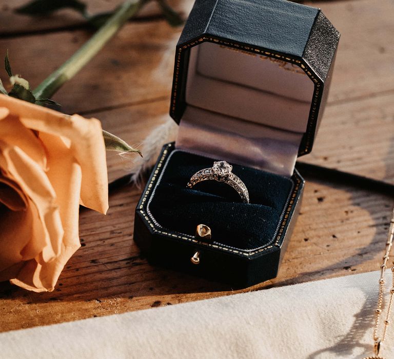 Scroll-patterned platinum diamond ring by London Victorian Ring Co. 