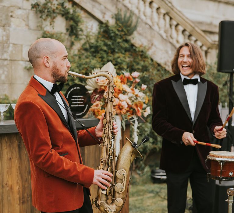 Saxophone and percussion duo in velvet dinner jackets 