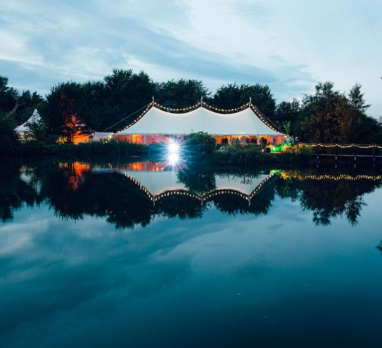 Marquee wedding with festoon lighting