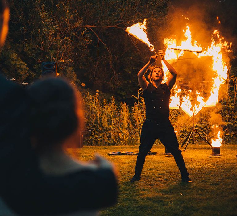 Fire entertainment for end of evening at classic wedding