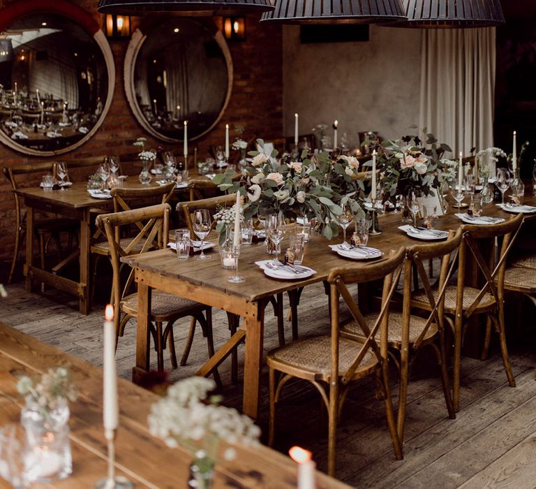 Simple table setting with pink, white and deep red flower arrangements for tables at No.38 The Park 