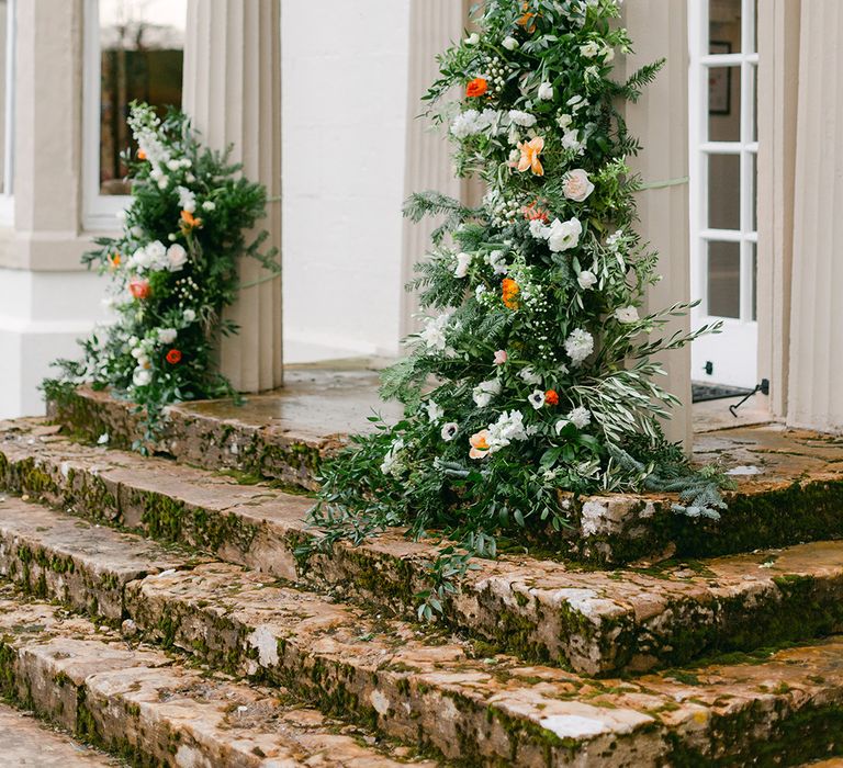 Column wedding flowers at Holesfoot, Cumbria with foliage, white and peach flowers 