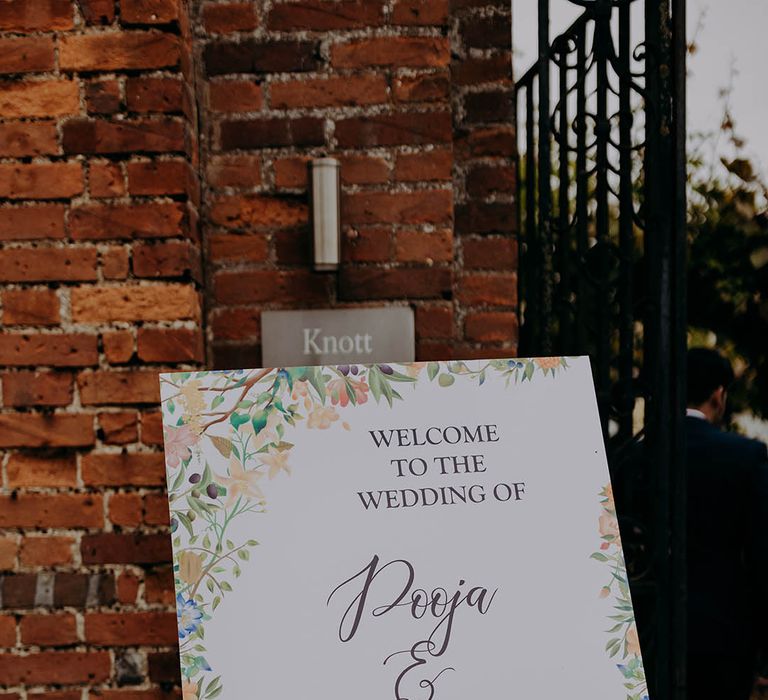 Welcome wedding signage complete with colourful watercolour floral illustration 