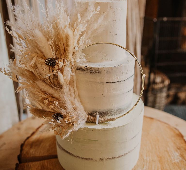 Semi-naked white frosted three tier wedding decor with hula hoop decoration with pampas grass for boho wedding 