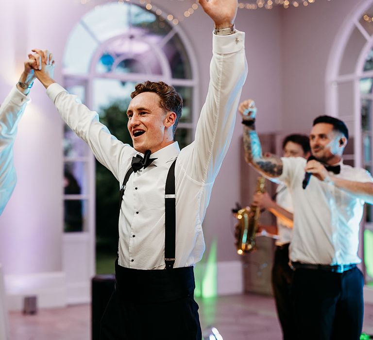 Grooms have their first dance together at Deer Park in Devon 