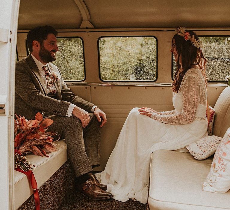 Bride and groom in wedding car VW camper van for industrial vintage wedding 