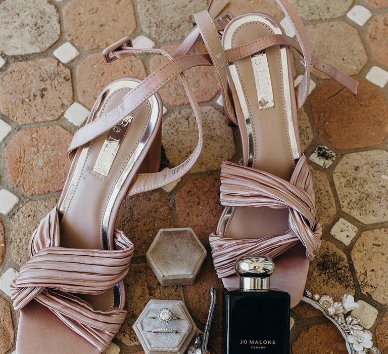 Pink square toe wedding shoes with Jo Malone London wedding perfume, pearl and enamel wedding headband and diamond halo engagement ring