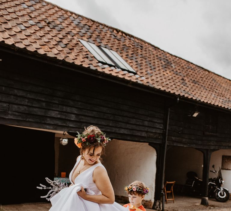 Bride and flower girls at rainbow wedding 