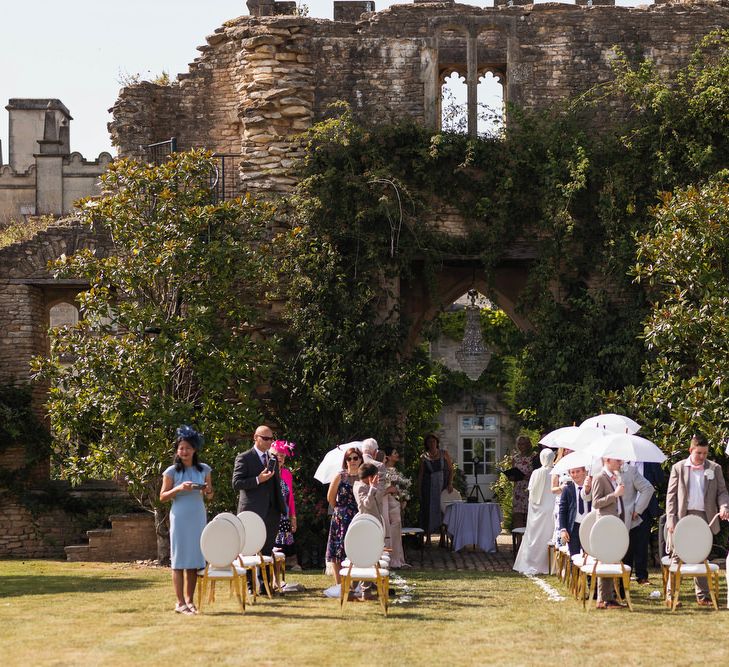 Outdoor wedding ceremony at the ruins in Euridge Manor 