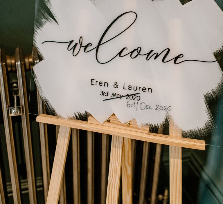 Change of date wedding welcome sign with original date crossed out 