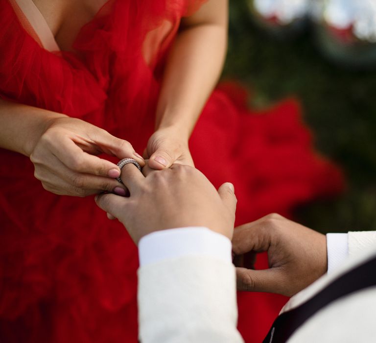 Exchanging wedding rings at Eastbrook Estate