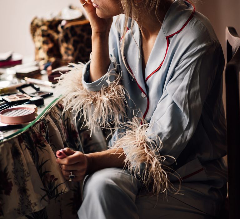 Bridal makeup preparations for DIY marquee wedding