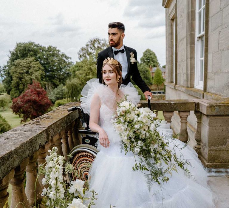 Disabled and interabled wedding inclusion revolution inspiration at Bourton Hall with bride in a tulle wedding dress and groom in a tuxedo 