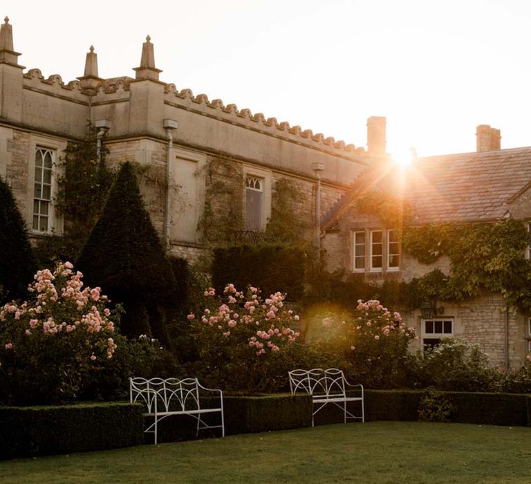 Sun setting over Euridge Manor on wedding day