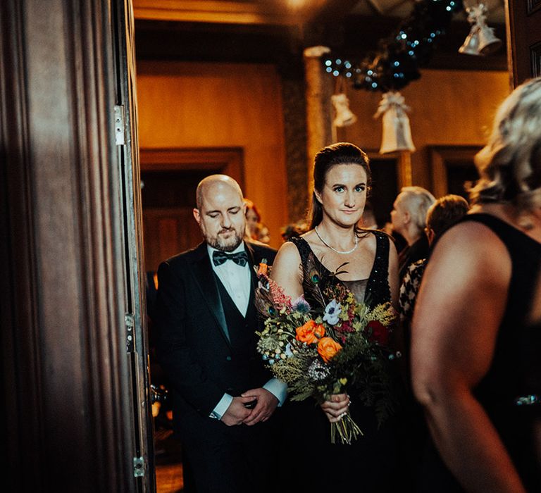 Bridesmaids and guests in black tie for LGBTQI+ wedding at Castle Leslie Estate