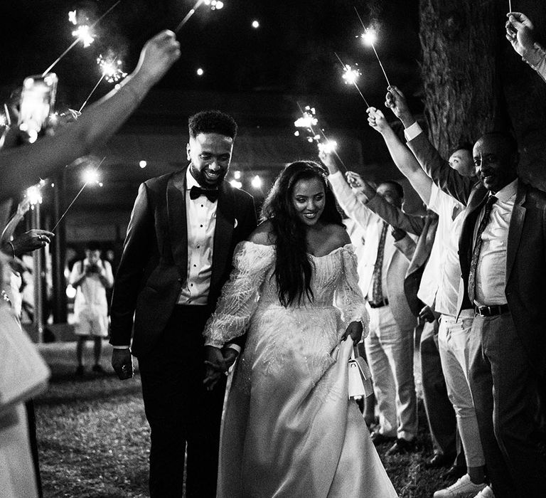 Bride & groom walk through sparkler exit on their wedding day in Phuket 