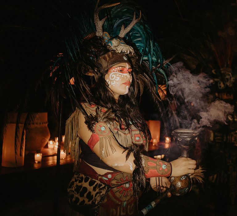 Traditional Mayan dancers outdoors in Tulum Mexico 