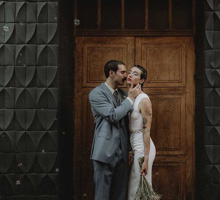 Gabriel in powder blue Gucci suit kisses Lisa in pre-loved wedding dress 