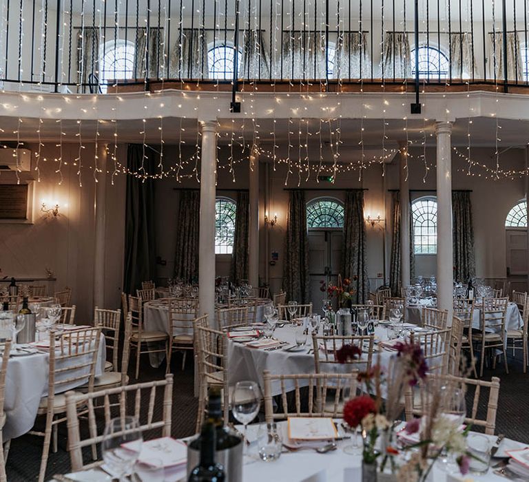 The Kings Chapel, Old Amersham wedding reception with string lights wedding decor 