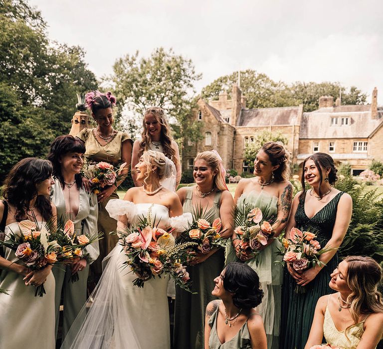 Wyresdale Park wedding with the bridal party wearing green bridesmaid dresses