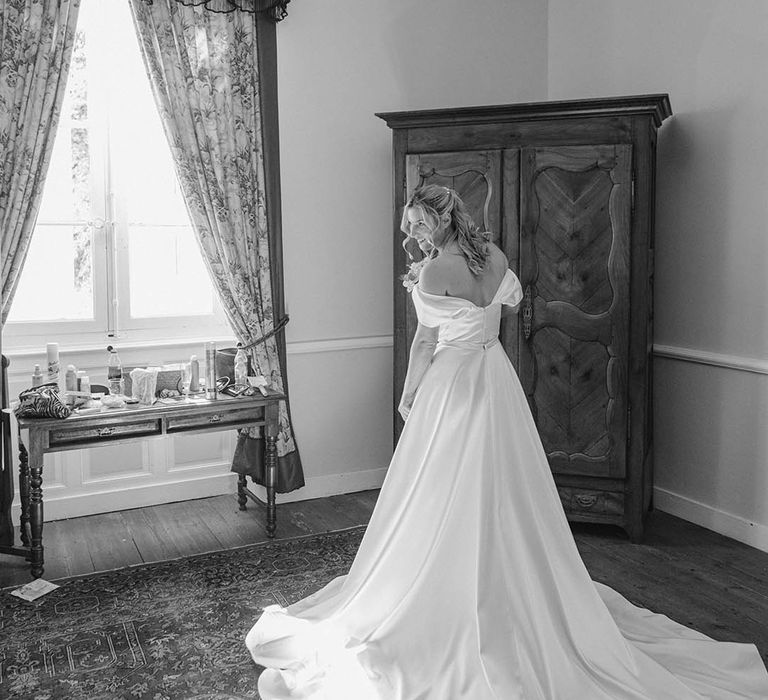 Bride in off the shoulder princess wedding dress at Chateau Lagorce wedding in France 