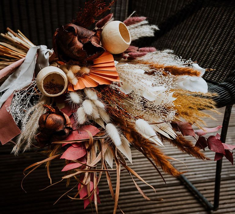 Pampas grass and dried palm leaves for boho bride's wedding bouquet