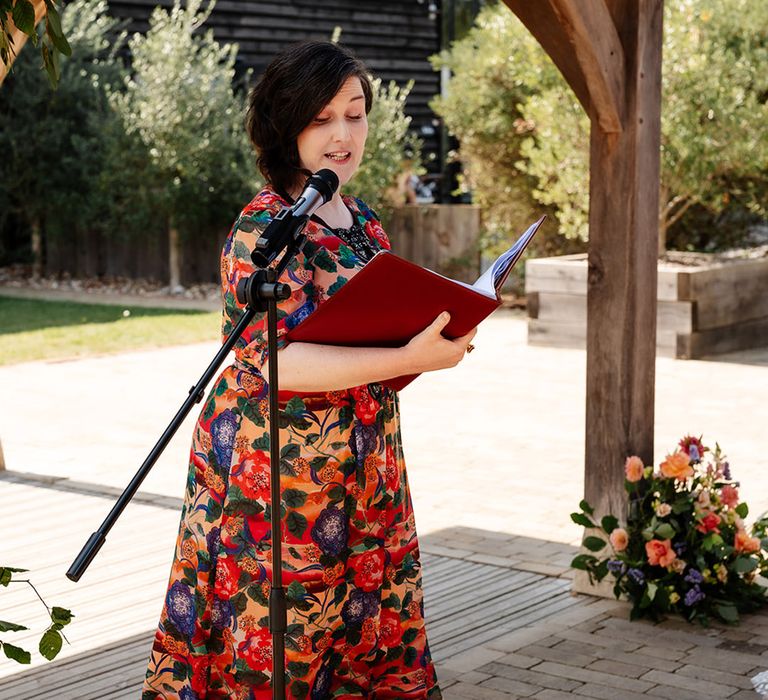 The wedding celebrant conducts a humanist wedding ceremony at The Canary Shed