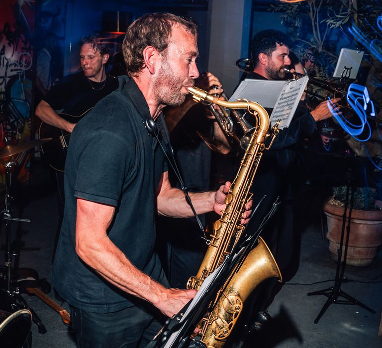 Saxophone player at wedding reception 