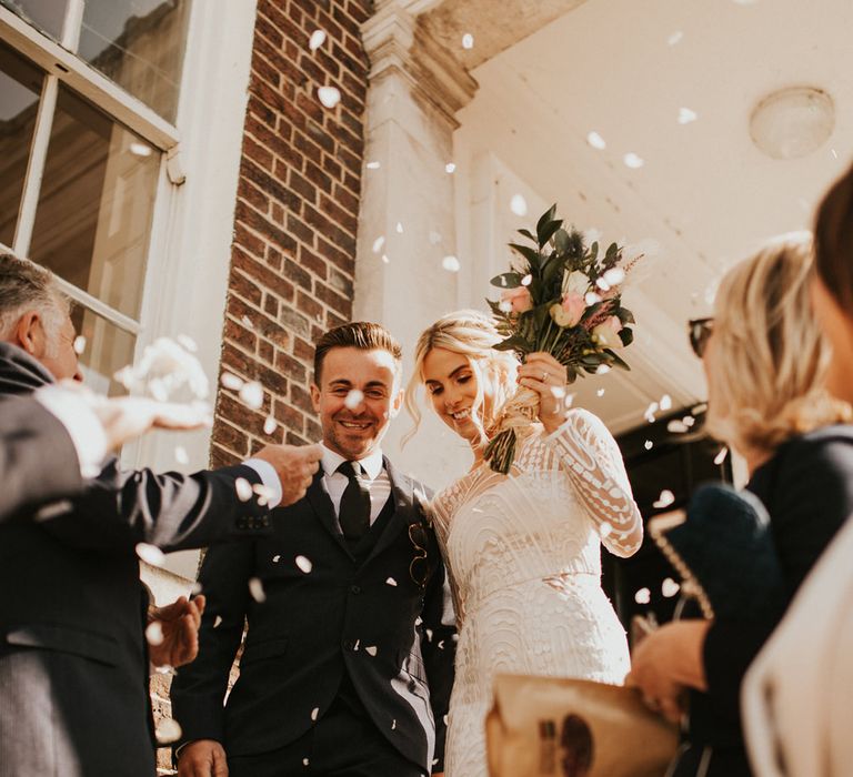 Bride and groom confetti moment at Poole Registry Office 