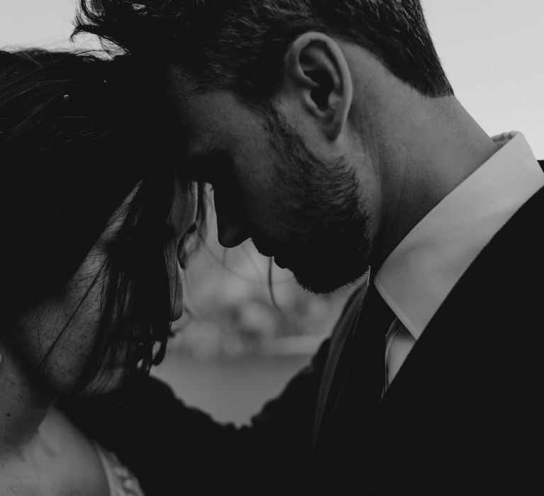 Intimate black & white image of bride & groom 