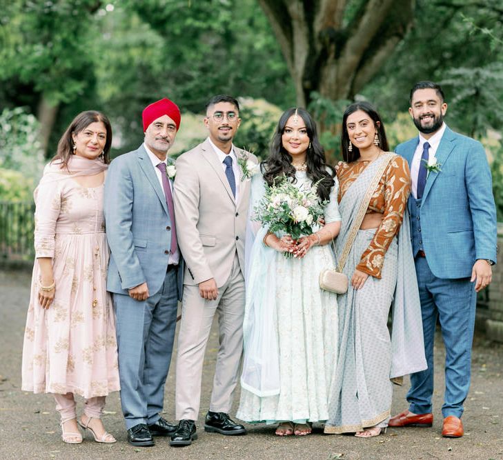 Islam and Sikh interfaith wedding family portrait 