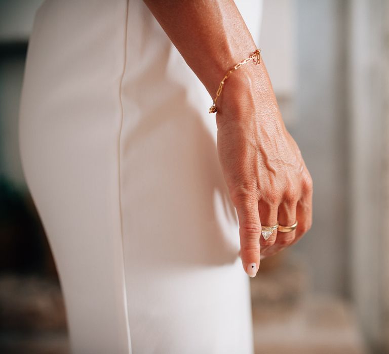 Simple gold wedding bracelet with gold wedding jewellery and minimal wedding nails