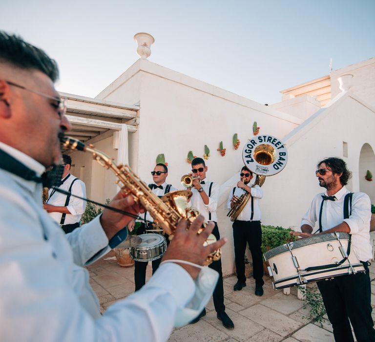 Zagor Street Band playing live brass instruments for the guests