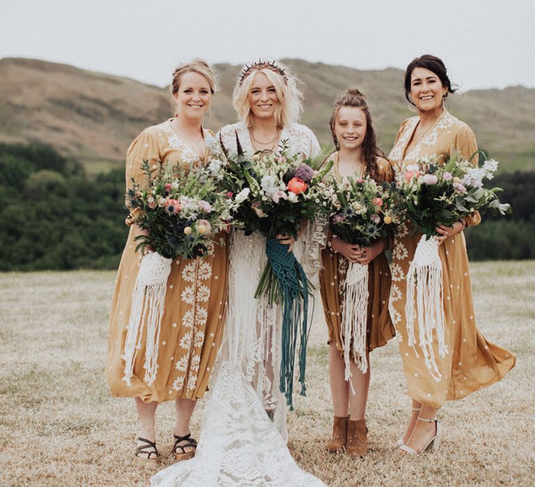 Mustard coloured loose bridesmaid dresses for a boho wedding 