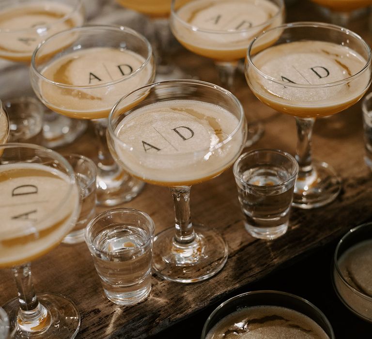 Personalised initial wedding drink toppers in the pornstar martini cocktails 