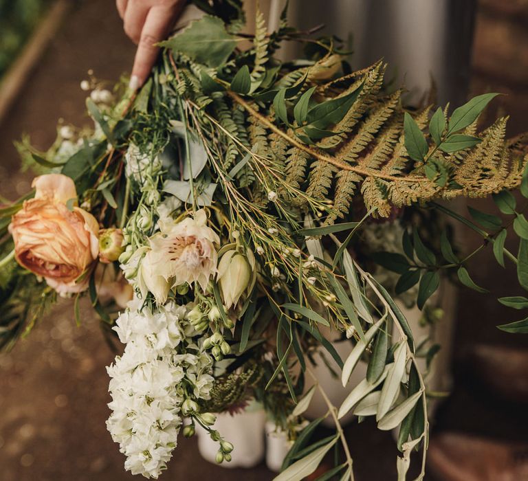 just picked bridal bouquet with foliage and peach David Austen roses 