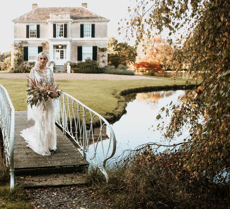 Bride arrives holding a pampas grass bouquet