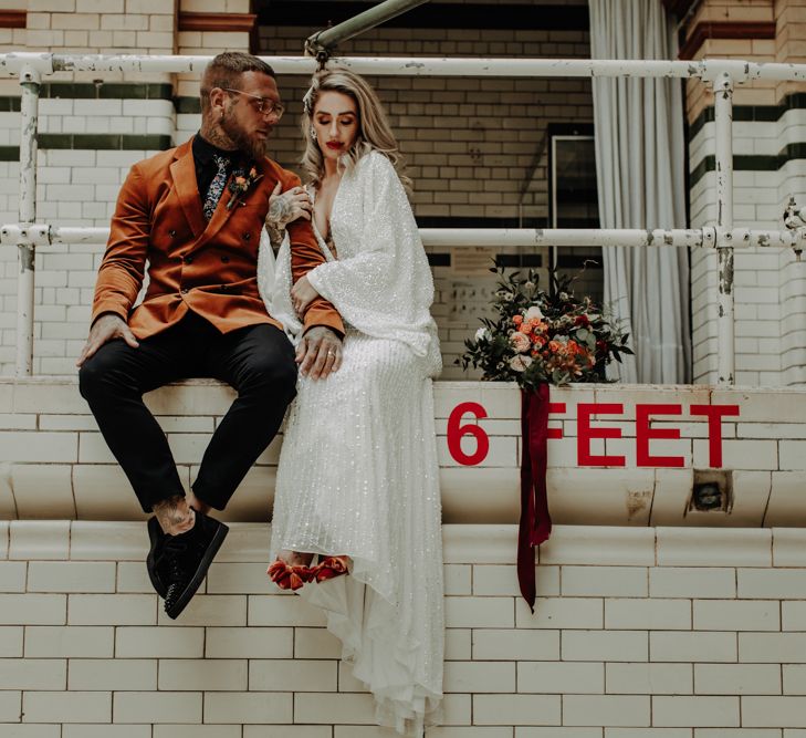 Couple pose at Victoria Baths