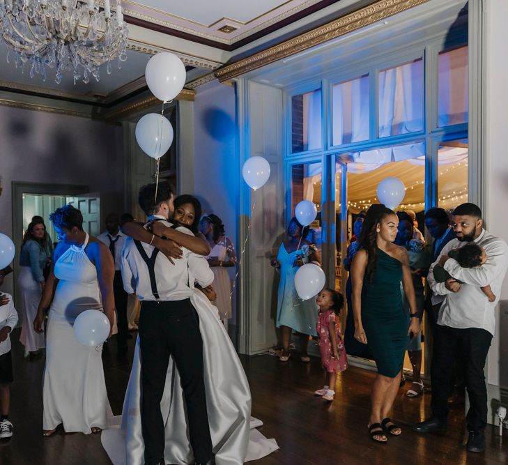 White balloons on the dance floor at Garthmyl Hall evening reception